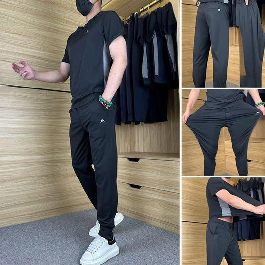 Avslappnade sportset med kortärmad topp och långbyxor för män